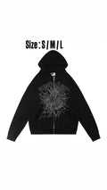 Sudadera negra con cierre | telaraña gris, fotografía del artículo proporcionada por la tienda